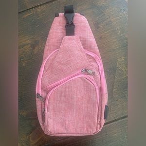Nupouch Crossbody Sling Backpack, USB charging port NWOT